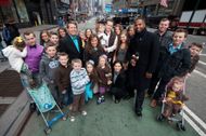 The Duggar Family Visits "Extra" (Image via Getty)